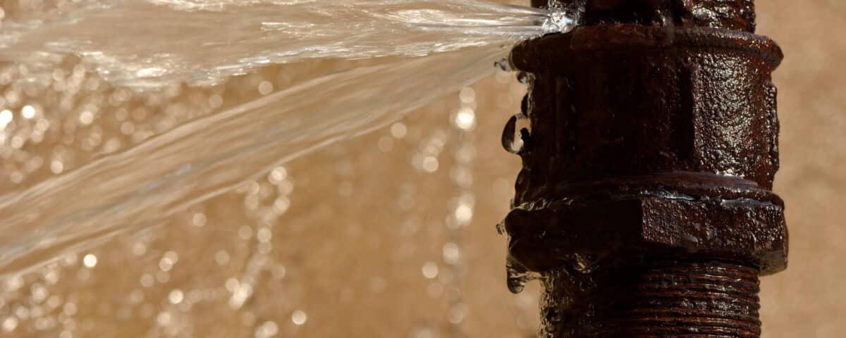 Rusty burst pipe in Baku Botanic Garden